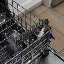 Load image into Gallery viewer, Bumkins Spoon + Fork: Sand sits in the utensil compartment of an open dishwasher.
