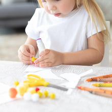 Load image into Gallery viewer, A child crafting with glue, pom-poms, scissors, and crayons on a Bumkins Splat Mat: Wander.
