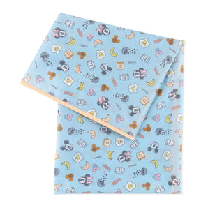 Bumkins Splat Mat: Mickey + Minnie Sunny Side Up, waterproof and stain-resistant, has a breakfast-themed print with Mickey and Minnie faces.