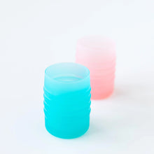 Load image into Gallery viewer, Bumkins Silicone Starter Cup: Blue sits in front of a pink cup on a white background.
