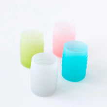 Load image into Gallery viewer, Four cups, including Bumkins Silicone Starter Cup: Gray, sit on a white background.
