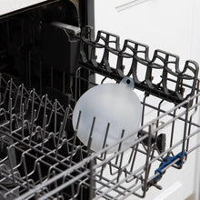 Load image into Gallery viewer, Bumkins Silicone Stretch Lid for Grip Bowl sits in the top rack of an open dishwasher.
