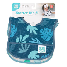 Load image into Gallery viewer, Bumkins Starter Bib 2 Pack: Dinosaurs &amp; Blue Tropic is shown on a white packaging header.
