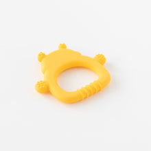 Load image into Gallery viewer, Silicone Flat Teether: Winnie the Pooh by Bumkins rests face down on a white background.
