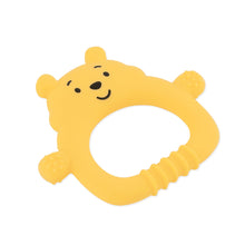 Load image into Gallery viewer, Bumkins Silicone Flat Teether: Winnie the Pooh is a yellow bear-shaped teething toy with a smiling face and textured handle.
