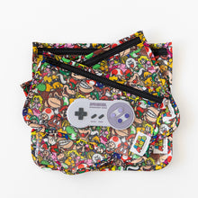 Load image into Gallery viewer, Bumkins Silicone Teether: Nintendo SNES™ Controller sits on top of colorful waterproof pouches on a white background.
