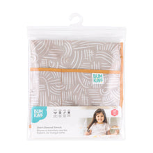 Load image into Gallery viewer, Bumkins Short-Sleeved Smock: Wander is shown folded in plastic packaging bag with a hanger and cardboard insert.
