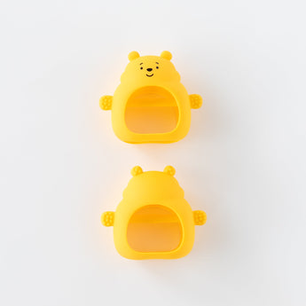 Two Bumkins Silicone Un-Droppable Mitt Teether: Winnie the Pooh shown front and back on a white background.