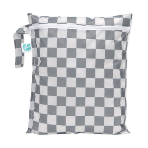 Bumkins Wet Bag: Charcoal Check features a gray and white checkered pattern on waterproof fabric, a zipper closure, and a side handle.