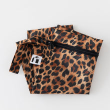 Load image into Gallery viewer, Roamio by Bumkins Wet Bag: Leopard rests folded on a white background.
