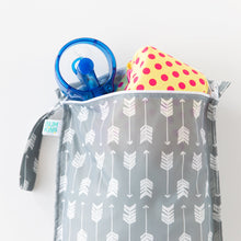 Load image into Gallery viewer, Bumkins Wet Bag: Arrow holds a yellow &amp; pink polka dot swimsuit and a blue fan on a white background.
