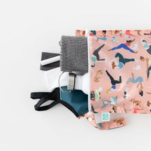 Load image into Gallery viewer, Bumkins Wet Bag: Yoga Pals holds a gray towel, water bottle, and gym clothing on a white background.
