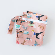 Load image into Gallery viewer, Bumkins Wet Bag: Yoga Pals lays folded on a white background.
