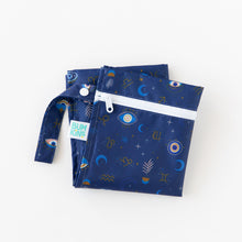 Load image into Gallery viewer, Bumkins Wet Bag: Evil Eye lays folded on a white background.
