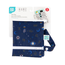 Load image into Gallery viewer, Bumkins Wet Bag: Evil Eye is shown folded on white cardboard packaging.
