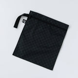 Roamio by Bumkins Wet Bag: Rich Black rests flat on a white background.