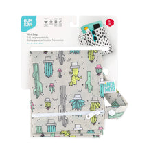 Load image into Gallery viewer, Bumkins Wet Bag: Cacti is shown folded on white cardboard packaging.

