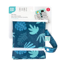 Load image into Gallery viewer, Bumkins Wet Bag: Blue Tropic is shown folded on white cardboard packaging.
