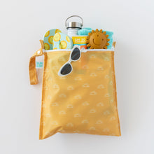 Load image into Gallery viewer, Bumkins Wet Bag: Sunshine holds a bottle, SPF 50 sunscreen, sunglasses, shoes, toy, and towel on a white background.
