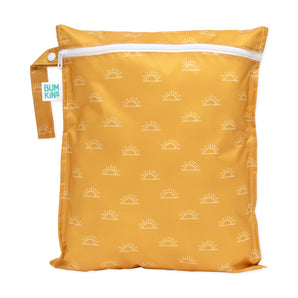 Bumkins Wet Bag: Sunshine has a yellow design with white sun pattern, a white zipper, and a waterproof fabric strap.