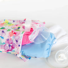Load image into Gallery viewer, Close-up of Bumkins Wet Bag: Watercolor with cloth diapers and a breast pump on a white background.
