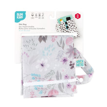 Load image into Gallery viewer, Bumkins Wet Bag: Floral is shown folded on white cardboard packaging.
