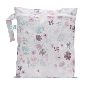 Bumkins Wet Bag: Floral features pastel pink, purple, and blue flowers on gray waterproof fabric, zipper closure, and side handle.