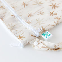 Load image into Gallery viewer, Close-up of Bumkins Wet/Dry Bag: Palm Daze on a white background, with focus on the zippers and snap-closure handle.
