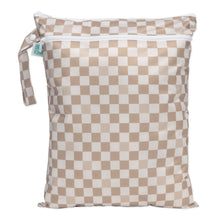 Load image into Gallery viewer, Bumkins Wet/Dry Bag: Sand Check is waterproof with two zippered compartments and a handle, ideal for organizing travel essentials.
