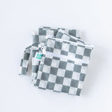 Bumkins Wet/Dry Bag: Charcoal Check lays folded on a white background.