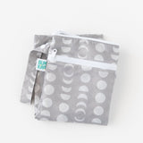Bumkins Wet/Dry Bag: Lunar Phase sits folded on a white background.
