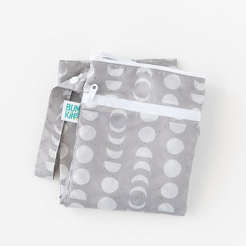Bumkins Wet/Dry Bag: Lunar Phase sits folded on a white background.