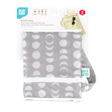 Load image into Gallery viewer, Bumkins Wet/Dry Bag: Lunar Phase is shown folded in its packaging.
