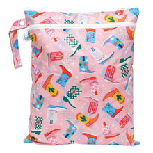 Load image into Gallery viewer, Bumkins Wet/Dry Bag: Boots has colorful cowboy boot designs on pink waterproof fabric.
