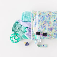 Load image into Gallery viewer, Bumkins Wet/Dry Bag: Aloha Stitch holds a teal towel, swimsuit, pacifier, toy ball and sunglasses on a white background.
