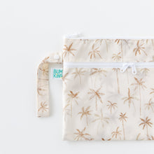 Load image into Gallery viewer, Bumkins Wet/Dry Clutch: Palm Daze, half visible, lays on a white background.
