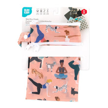 Load image into Gallery viewer, Bumkins Wet/Dry Clutch: Yoga Pals is shown folded in its packaging.
