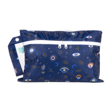 Load image into Gallery viewer, Bumkins Wet/Dry Clutch: Evil Eye in dark blue waterproof fabric, patterned with eyes and stars, has a white zipper and a handy side handle.
