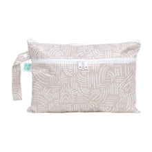 Load image into Gallery viewer, Bumkins Wet/Dry Clutch: Wander in beige with white abstract lines, a side strap, and waterproof fabric; ideal for wet/dry use.
