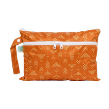 Load image into Gallery viewer, Bumkins Wet/Dry Clutch: Grounded is an orange pouch with waterproof fabric, a white geometric pattern, handle, and two zippered compartments.
