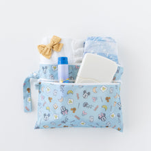 Load image into Gallery viewer, Bumkins Wet/Dry Clutch: Mickey + Minnie Sunny Side Up stores diapers, wipes, clothes, and sunscreen on a white background.
