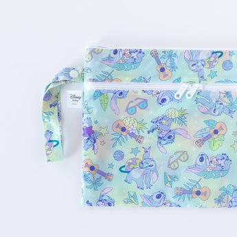 Bumkins Wet/Dry Clutch: Aloha Stitch is half visible as it lays flat on a white background.