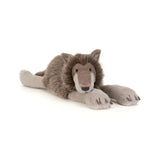 Jellycat Ulrich Wolf, a collectible plush by Jellycat, features grey and brown fur and is lying down on a white background.