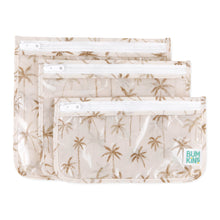 Load image into Gallery viewer, Bumkins Clear Travel Bag 3 Pack: Palm Daze includes three waterproof, TSA-compliant pouches with white zippers and a palm tree print.

