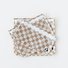 Load image into Gallery viewer, Roamio by Bumkins Clear Travel Bag 3 Pack: Sand Check is stacked on a white background.
