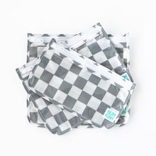 Load image into Gallery viewer, Bumkins Clear Travel Bag 3 Pack: Charcoal Check are displayed overlapped on a white background.
