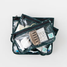 Load image into Gallery viewer, Bumkins Clear Travel Bag 3 Pack: Starry Cactus are stacked on a white background, filled with toiletries, hair accessories and mints.
