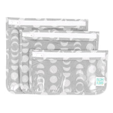 Load image into Gallery viewer, Bumkins Clear Travel Bag 3 Pack: Lunar Phase includes three TSA-compliant pouches with a white lunar phase design on gray waterproof fabric.
