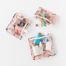 Load image into Gallery viewer, Bumkins Clear Travel Bag 3 Pack: Yoga Pals holds makeup, sunglasses, and toiletries on a white background.
