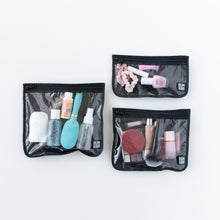 Load image into Gallery viewer, Bumkins Clear Travel Bag 3 Pack: Rich Black holds toiletries and makeup on a white background.
